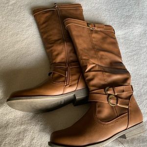 FOCUS  - Tall, faux leather cognac boots w/ buckle side-strap details, S…